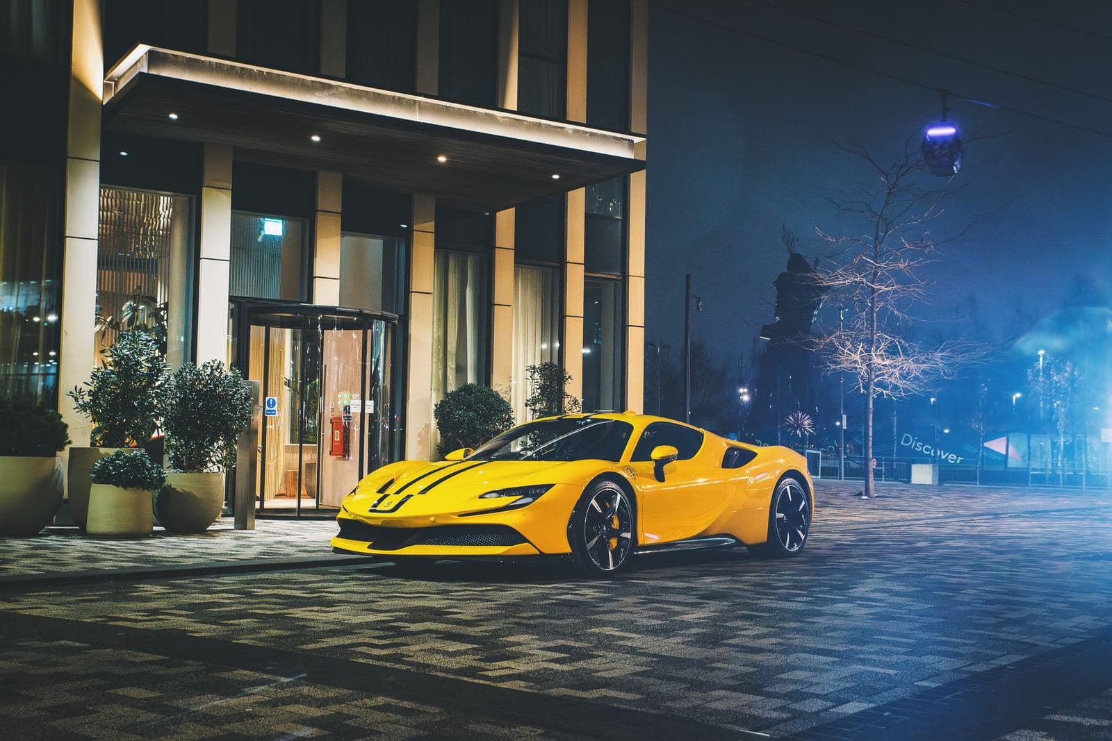 Ferrari SF90 at hotel entrance